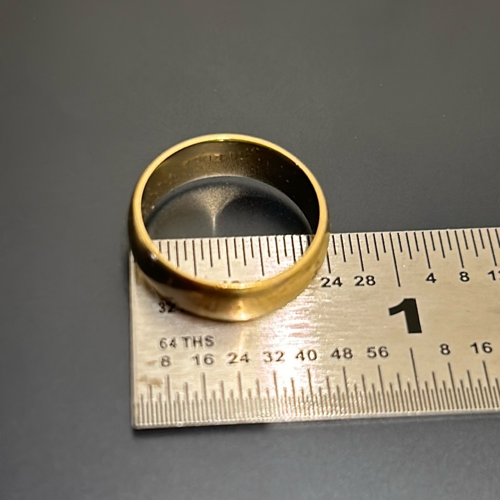Gold band 18k. size 7. Womens. 
Bachendorf’s.